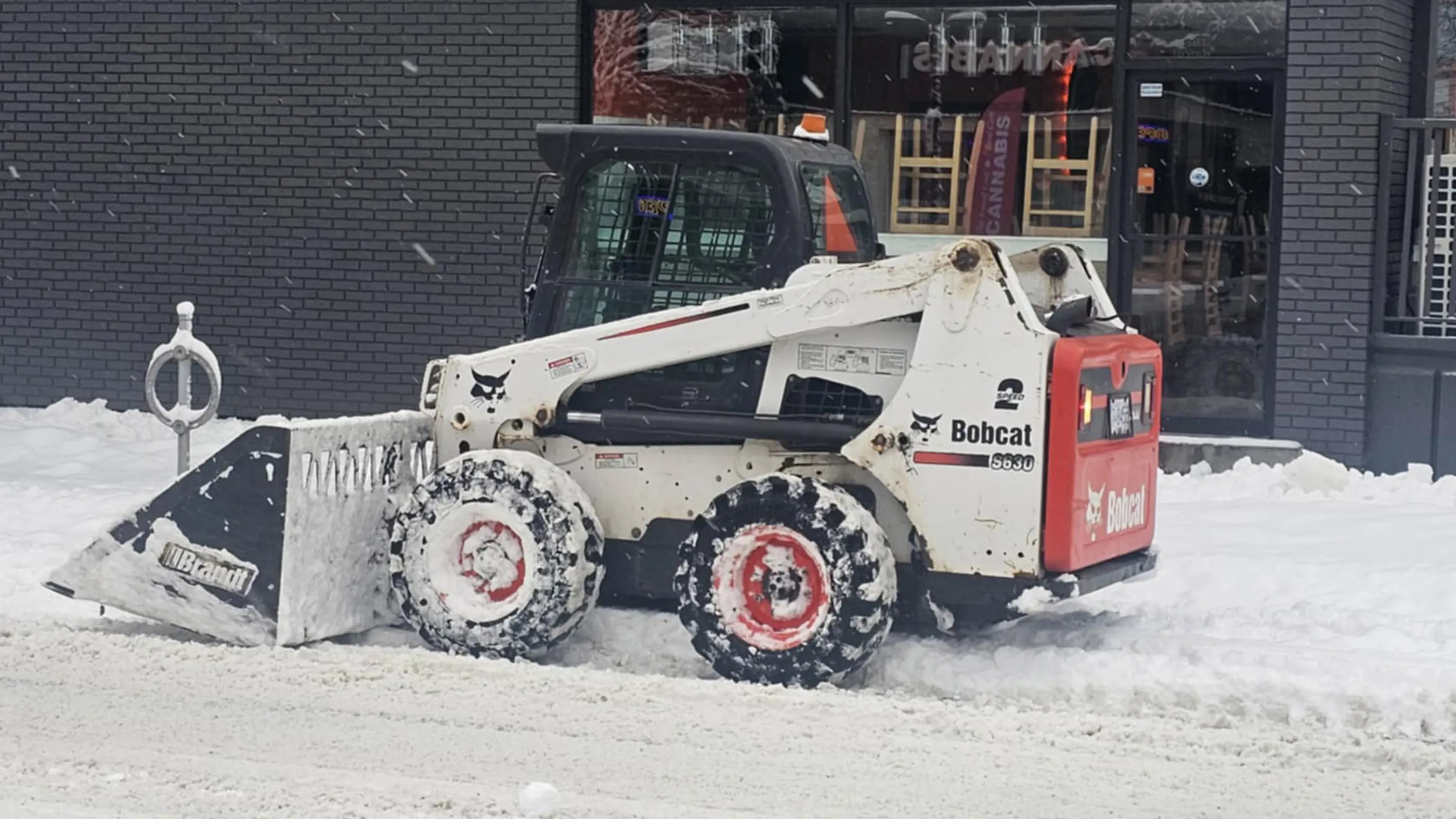 Snow Clearing Skid Steers with wide bucket